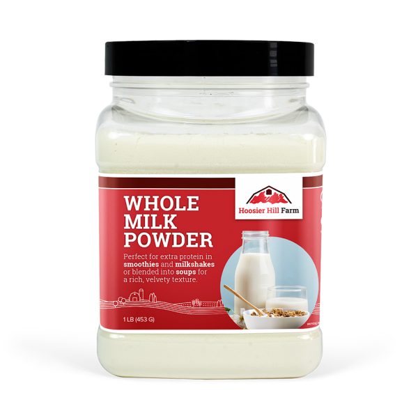 Jar of Hoosier Hill Farm whole milk powder on a white background