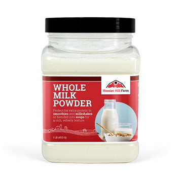 Jar of Hoosier Hill Farm whole milk powder on a white background