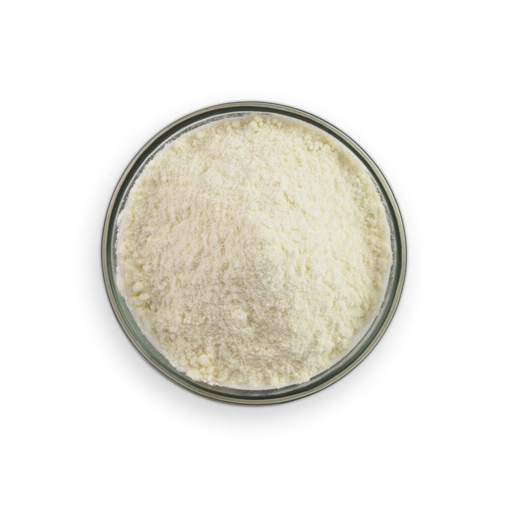 Glass jar filled with a white powdery substance on a white background