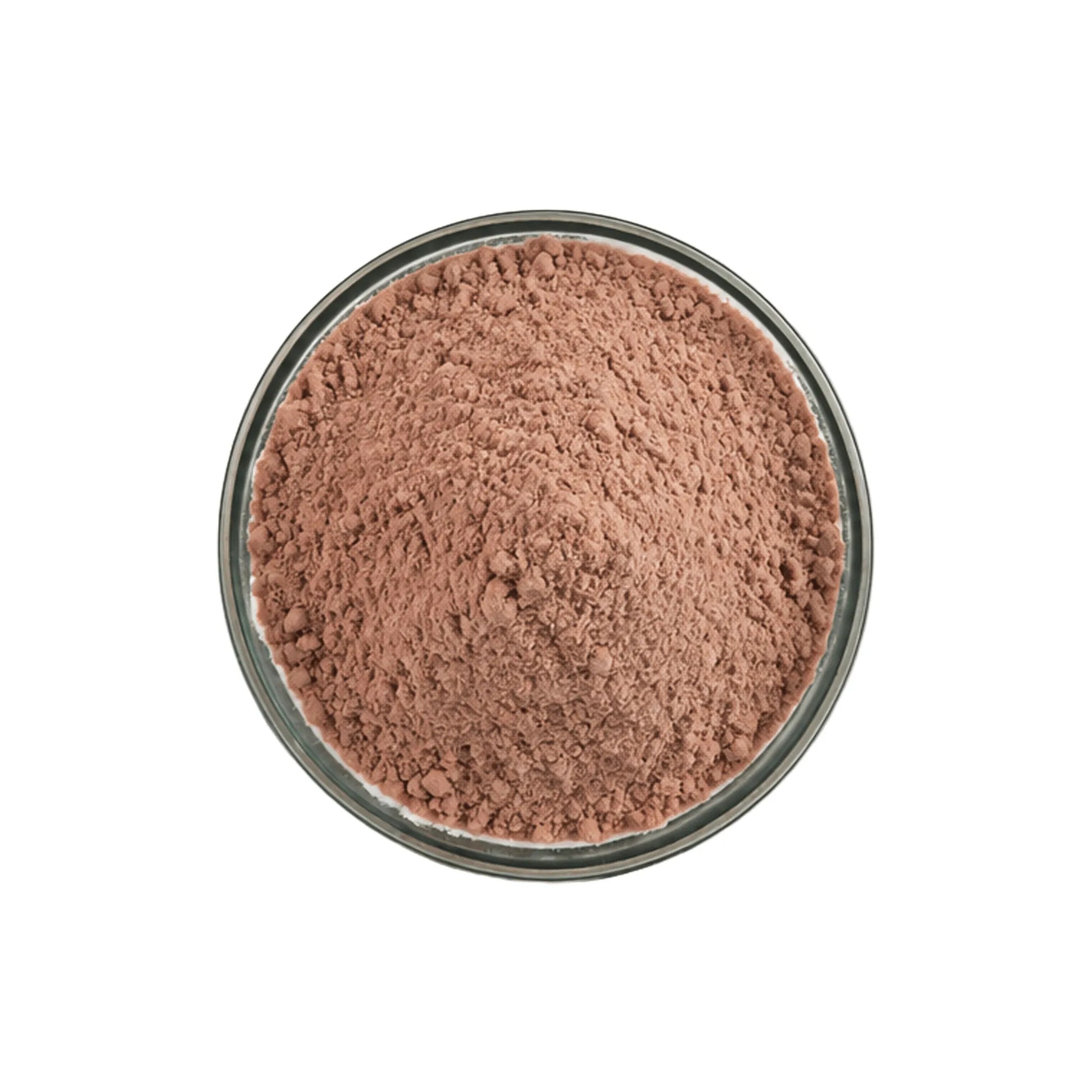 A top-down view of a fine brownish-pink powder piled in a clear round container against a solid white background.