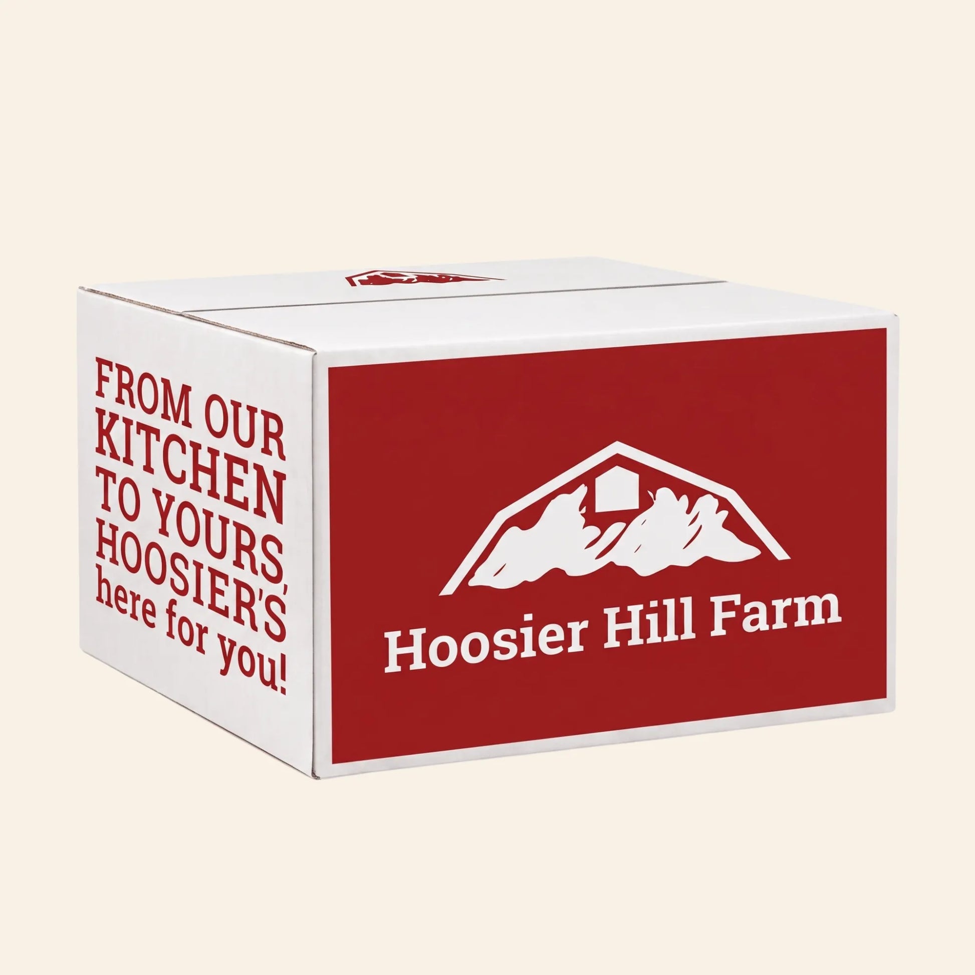 A white cardboard box with a large red front panel featuring the white Hoosier Hill Farm logo and text, plus red text on the side, shown on a plain light beige background.