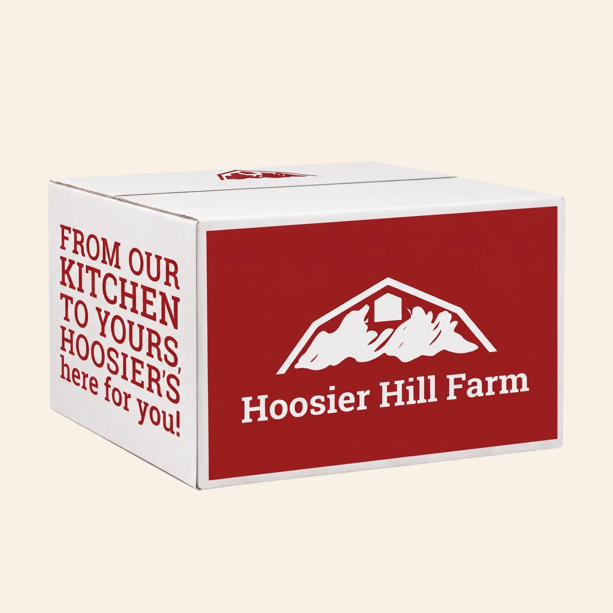 A white cardboard box with a large red front panel featuring the white Hoosier Hill Farm logo and text, plus red text on the side, shown on a plain light beige background.